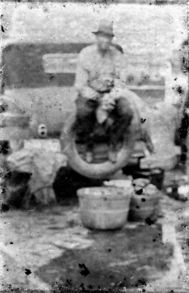 1930s father selling potatos